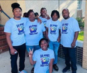 Picture of six of Dale Edward Brown's family members in matching shirts