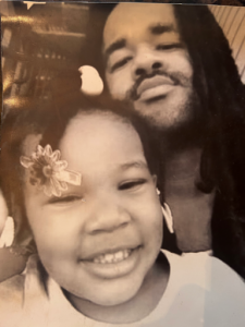 Lamar with his daughter